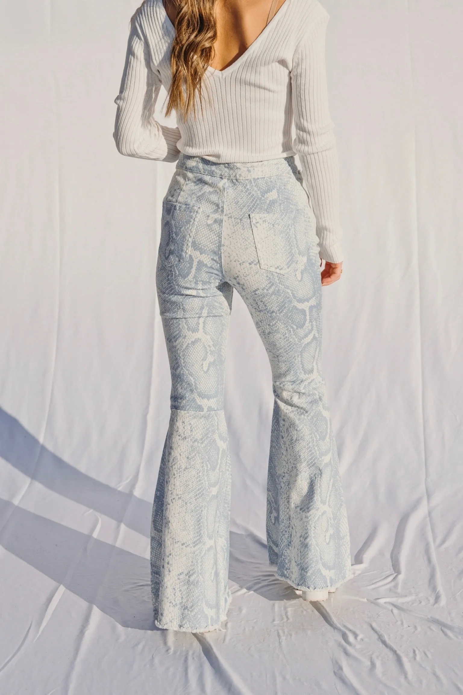 Zane Snake Print Flares